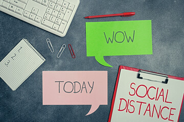 Writing note showing Social Distance. Business concept for maintaining a high interval physical...