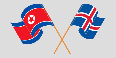 Crossed and waving flags of North Korea and Iceland