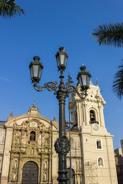LIMA, PERU: View of the ornamental poles and buildings in the main square of the city