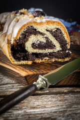 Poppy seed strudel with icing.