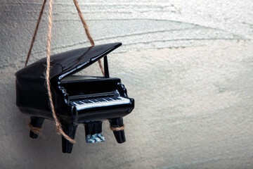 image of black piano rope sharp wall 