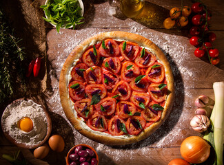 Pizza with tomato, olive and basil. Top view on wood background, close up. Traditional Brazilian Pizza