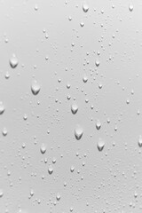 Close up of water drops on white background.