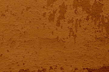 A brown wall with peeling paint. Gentle brown old wall