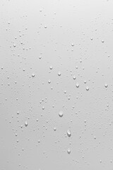 Close up of water drops on white background.
