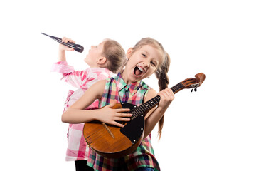 Two cute little girls posing with a microphone and domra.