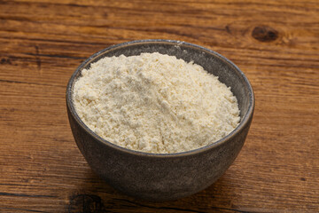 Wheat flour heap in the bowl