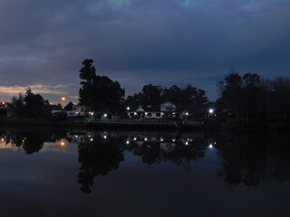 Fototapeta na wymiar reflection of a house at sunset