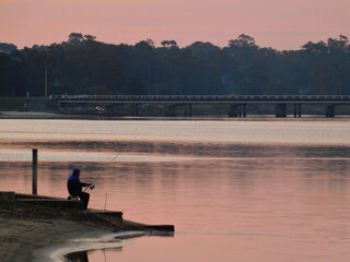 fishing at sunset