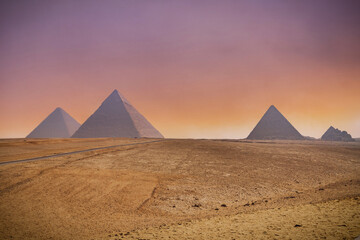 Fototapeta na wymiar The Great Pyramids of Giza and beautiful sunsets