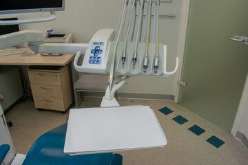 Dental unit for dental treatment and a pull-out table