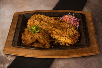 seco de carne y tacu tacu