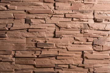 Decorative stone wall as background.