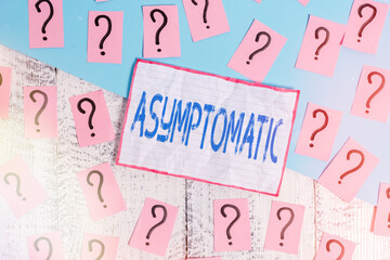 Handwriting text Asymptomatic. Conceptual photo a condition or an individual producing or showing...