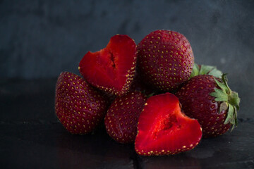 strawberries on black background