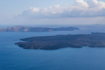 Fototapeta na wymiar Coast and sea landscape at Megalochori on Santorini island in Greece.