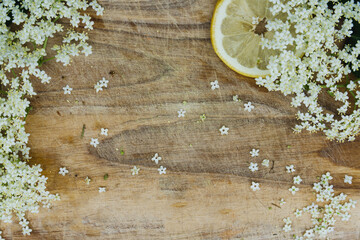 preparation of elderberry juice, ingredients of elderflower and lemon.