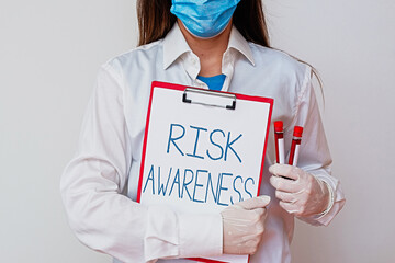 Handwriting text writing Risk Awareness. Conceptual photo recognizing factors that may cause a...