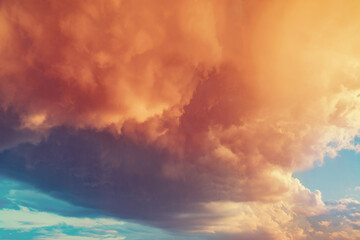 Dark storm clouds before the rain at sunset.