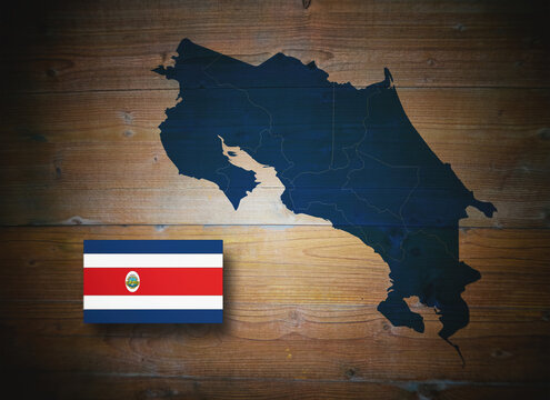 Map and flag of Costa Rica, Central America, on wooden background, 3D illustration