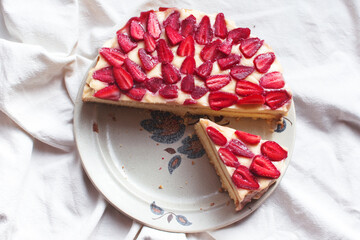 Tart with strawberries and whipped cream. Top view