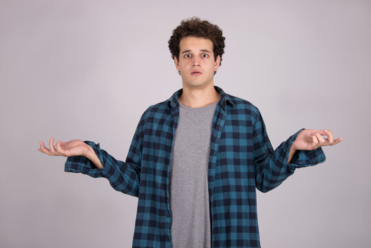 Indifferent Body Language, Whatever Facial Expression Man Isolated, Studio Shot On White Background