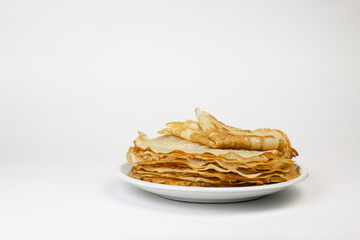 Homemade crepes on white wooden background. breakfast concept.

