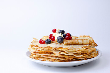 Homemade crepes with butter and barriers close up image. Natural breakfast concept.