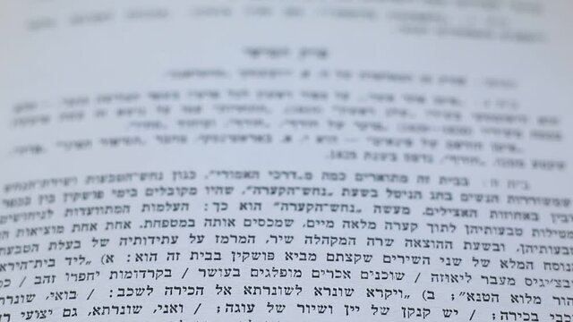 Hebrew Text in Book - Slow panning shot