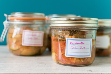 jam jar of ratatouille with vegetables in the kitchen interior