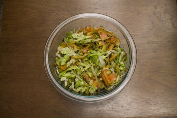 Delicious and nutritious salad with lettuce, broccoli and tomato.