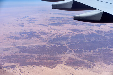 Naklejka na ściany i meble aerial view of the Sahara desert in Tamanrasset, Algeria