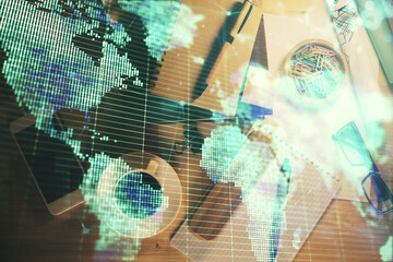 Multi exposure of business theme drawing and work table top veiw. Concept of international finance.
