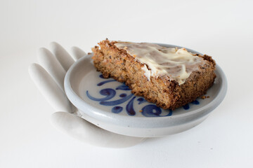 sliced carrot cake, served on a ceramic plate