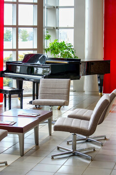 Baby Grand Piano I With Seating In A  Open Airy Lounge Area