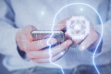 Double exposure of man's hand holding and using a digital device and brain hologram drawing. Data concept.