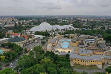 The Szechenyi Spa is one of the largest spa complexes in Europe in the Budapest City Park. In the background is the capital's Great Circus, and the capital's Zoo - Budapest - Hungary / June.11.2020.