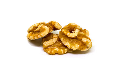 Natural walnut on white background. Cracked and cleaned nut seeds. Simple organic food. Tasty healthy snack