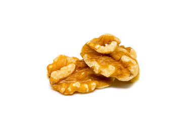 Natural walnut on white background. Cracked and cleaned nut kernel. Organic food studio photo.