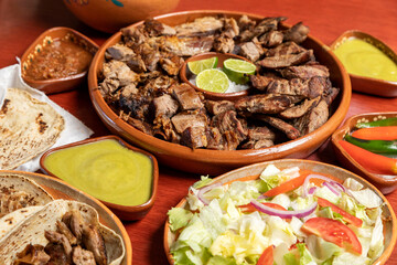 Mexican food. Grilled roast meats.
