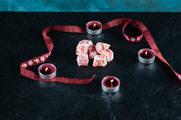 Red lokum pieces on the table