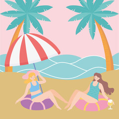 Obraz na płótnie Canvas summer time beach girls sitting on floats vacation tourism