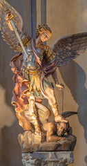 Fototapeta na wymiar RAVENNA, ITALY - JANUARY 29, 2020: The carved polychrome statue of archangel Michael in church Chiesa di Santa Maria in Porto.
