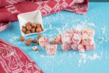 Red lokum candies with nuts