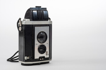 Vintage amateur film camera isolated on a white background with room for copy to the right