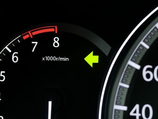 car turning signal light on car dashboard.