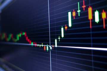 Stock exchange market graph on screen monitor. Economic and financial concept.