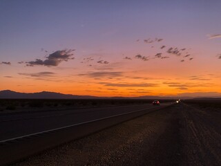 Naklejka premium sunset on the highway