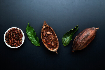 Composition with cocoa pod black texture background
