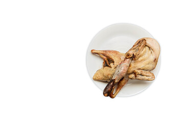 Raw duck breast in white plate